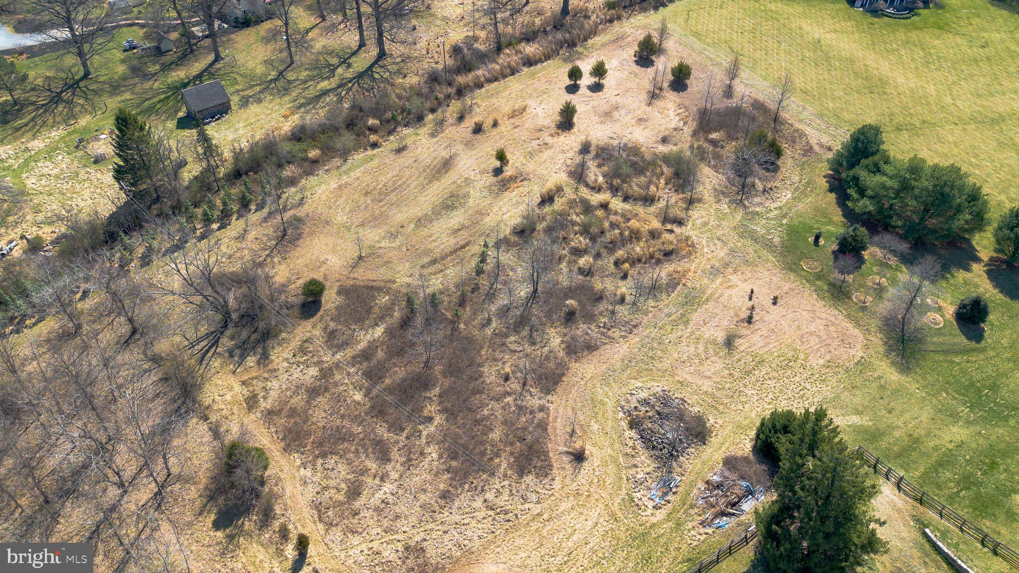 6001 Riggs Road Laytonsville, MD 20882 - Photo 3 of 12 a backyard of a house with green space