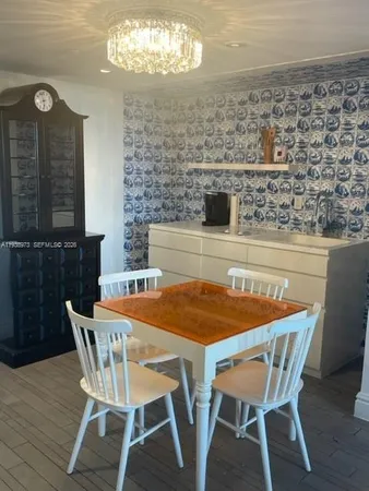 a kitchen with a cabinets and a stove