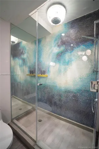 a bathroom with a bathtub and sink