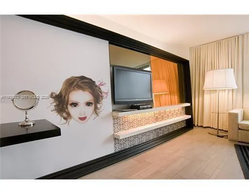 a view of a patio with a table chairs and a fire pit