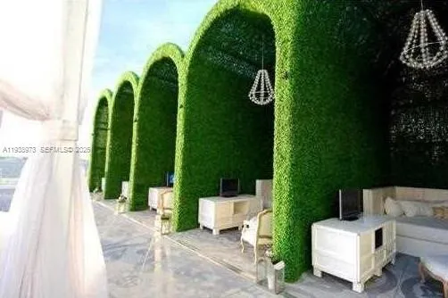 a view of swimming pool with outdoor seating