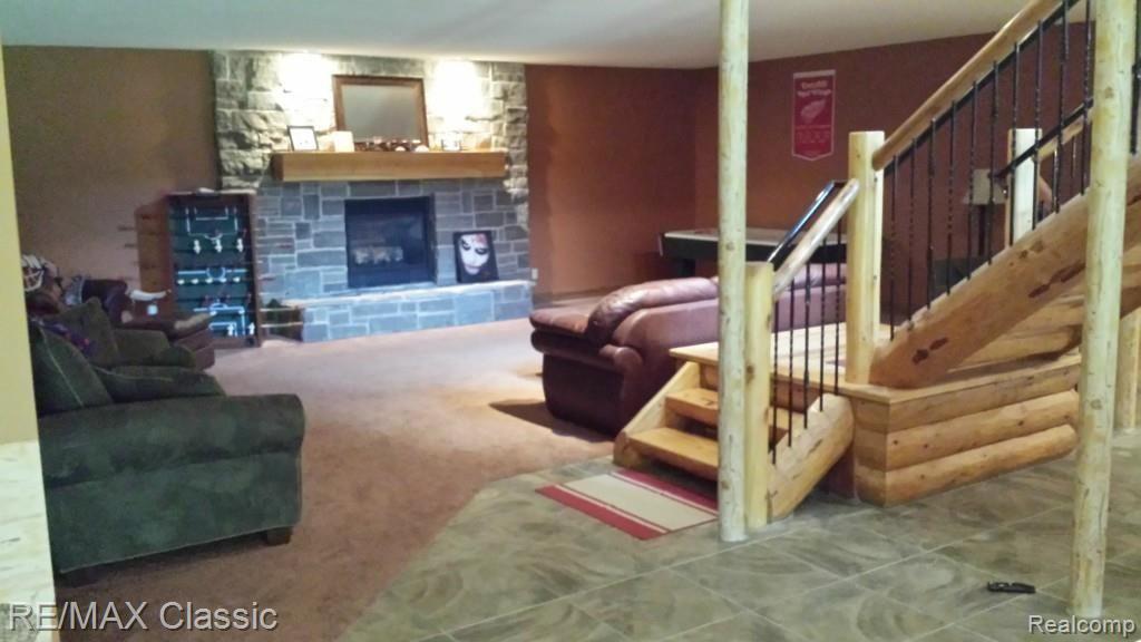 11169 Hyne Road Brighton, MI 48114 - Photo 26 of 48 BASEMENT FIREPLACE.jpg