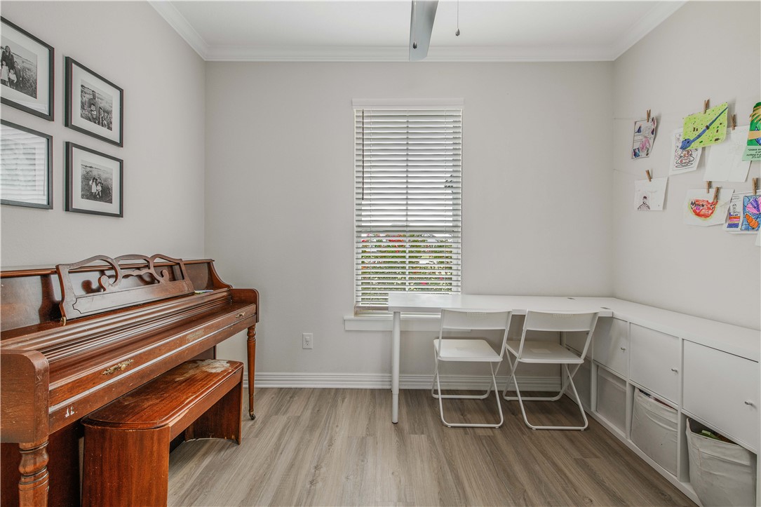 3332 Hunters Crossing Bryan, TX 77808 - Photo 12 of 26 a view of a workspace with furniture and a window