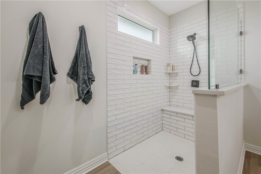 3332 Hunters Crossing Bryan, TX 77808 - Photo 15 of 26 a bathroom with a shower