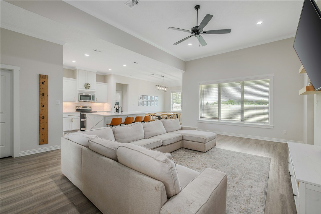 3332 Hunters Crossing Bryan, TX 77808 - Photo 19 of 26 a living room with furniture and a large window
