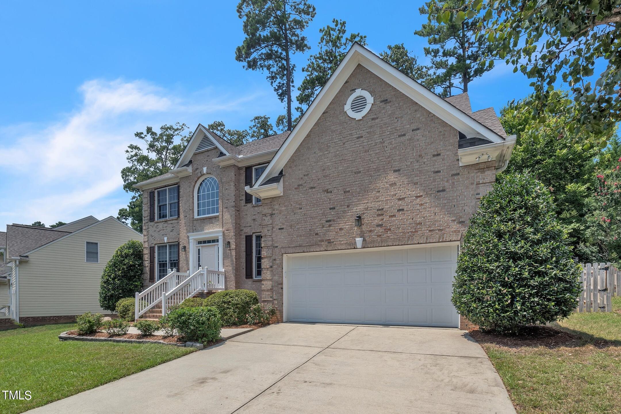 4702 Regency Drive Durham, NC 27713 - Photo 2 of 45 front view of a house with a yard