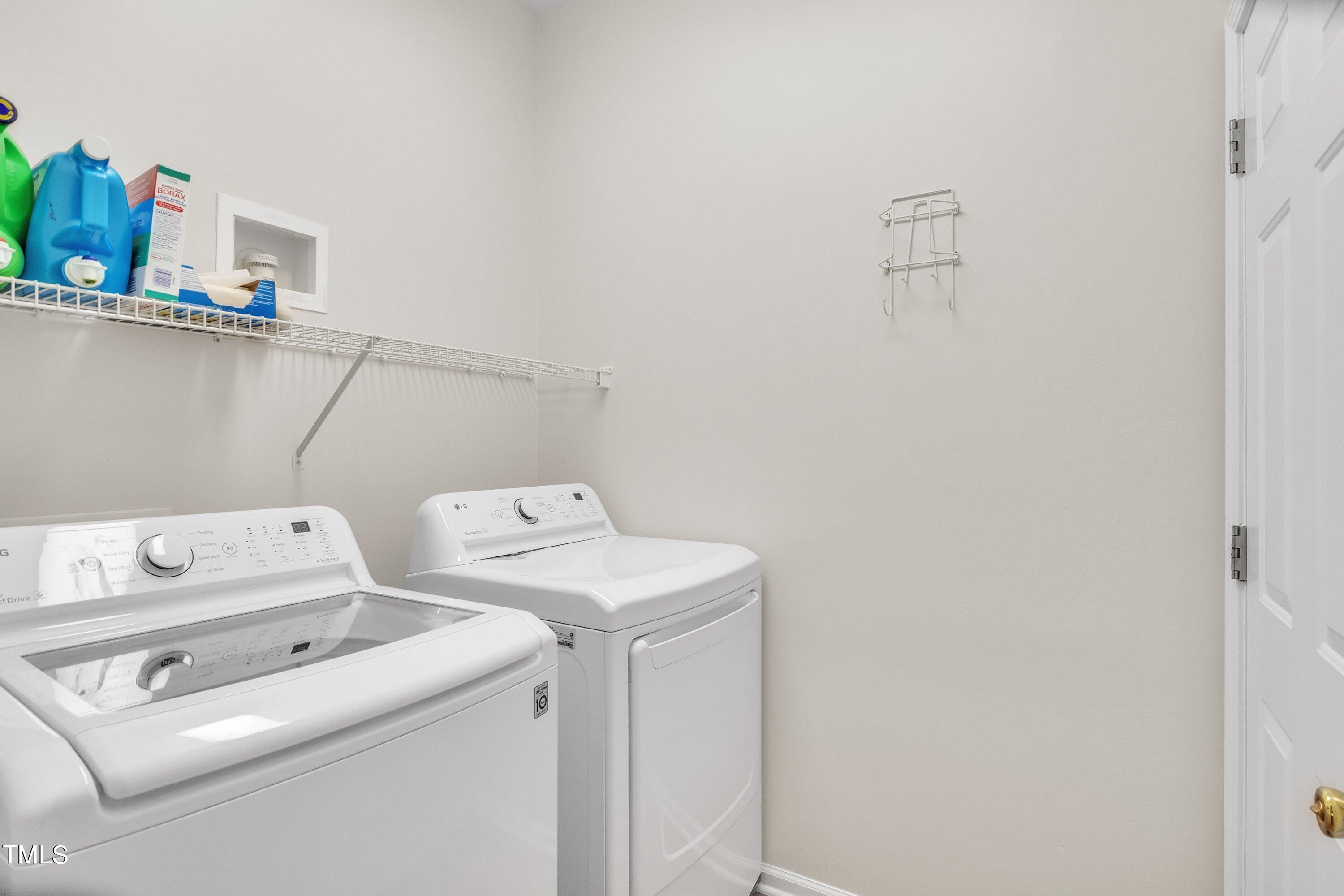 4702 Regency Drive Durham, NC 27713 - Photo 24 of 45 a utility room with dryer and washer