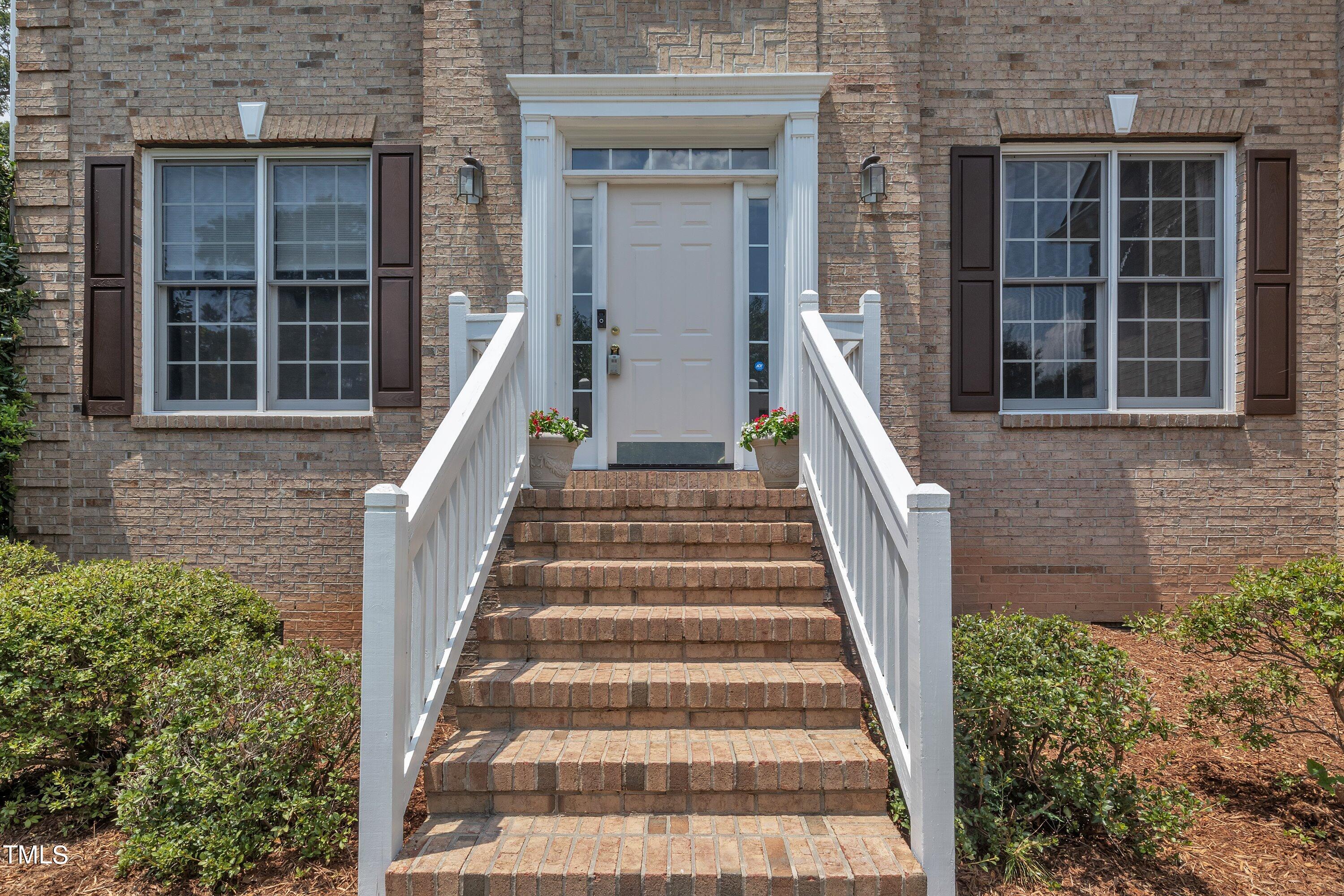 4702 Regency Drive Durham, NC 27713 - Photo 3 of 45 a view of a house with entryway and windows