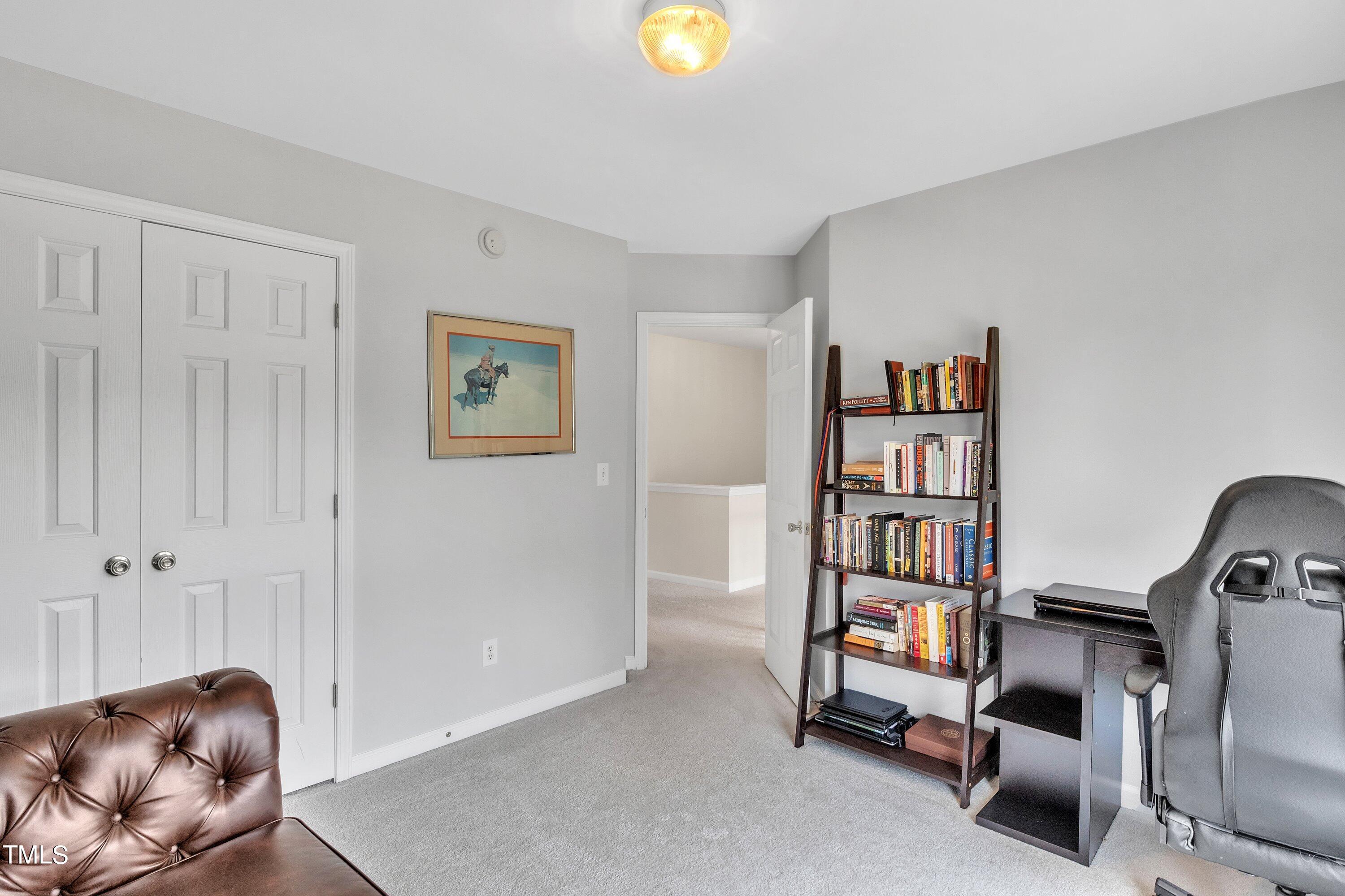4702 Regency Drive Durham, NC 27713 - Photo 34 of 45 a view of a livingroom with furniture and closet