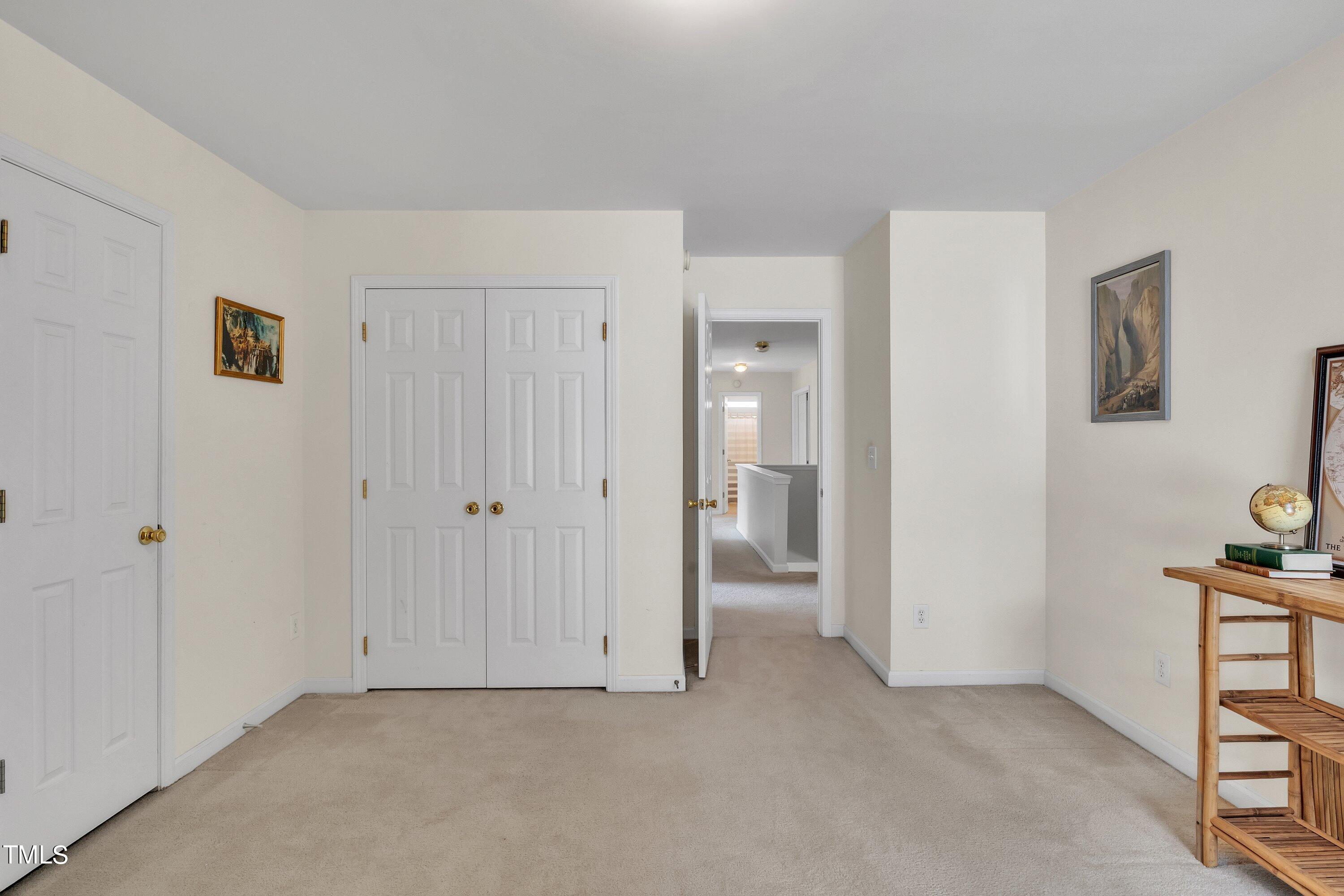 4702 Regency Drive Durham, NC 27713 - Photo 36 of 45 a view of an empty room and a bathroom