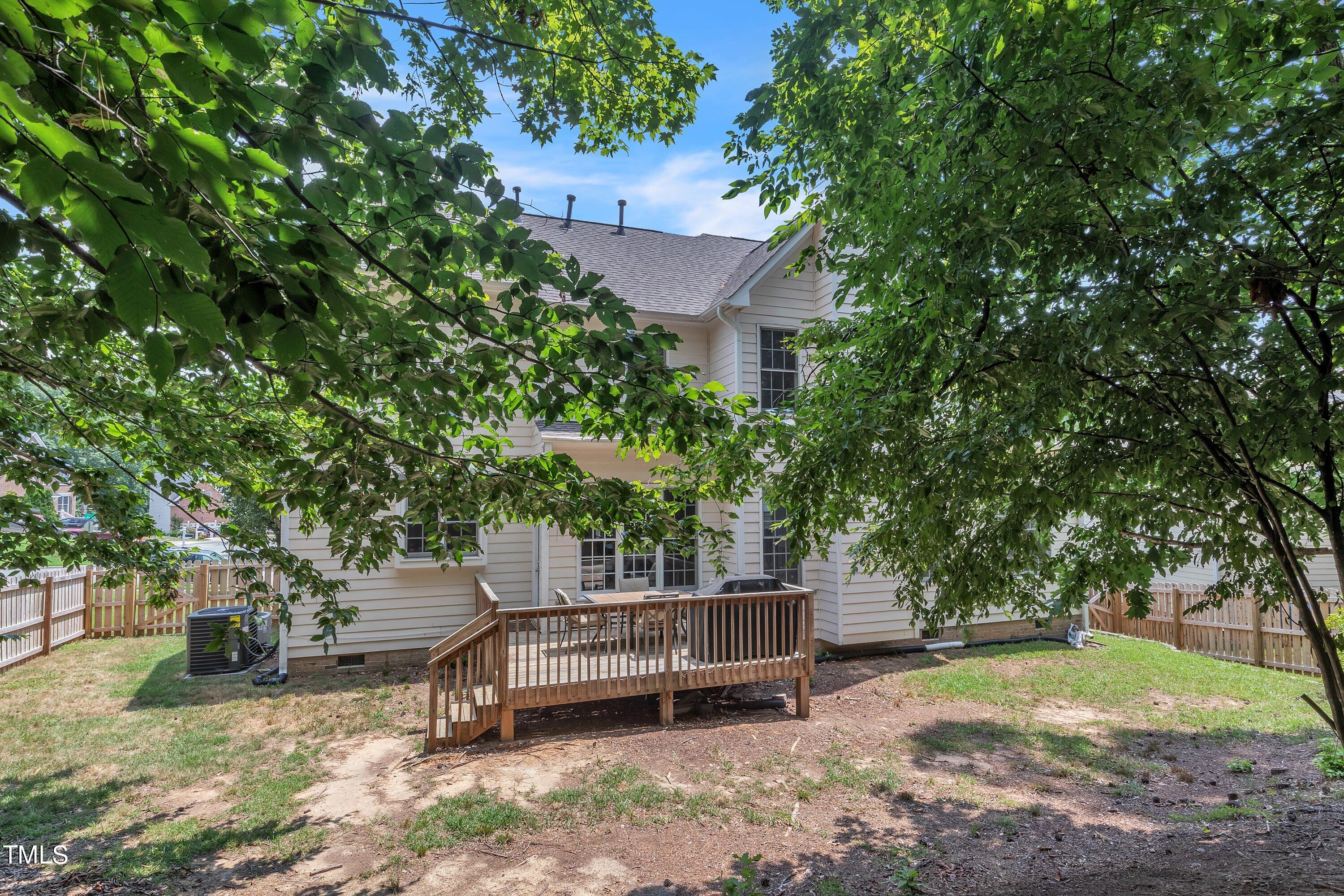 4702 Regency Drive Durham, NC 27713 - Photo 41 of 45 a view of a chair and table in the backyard
