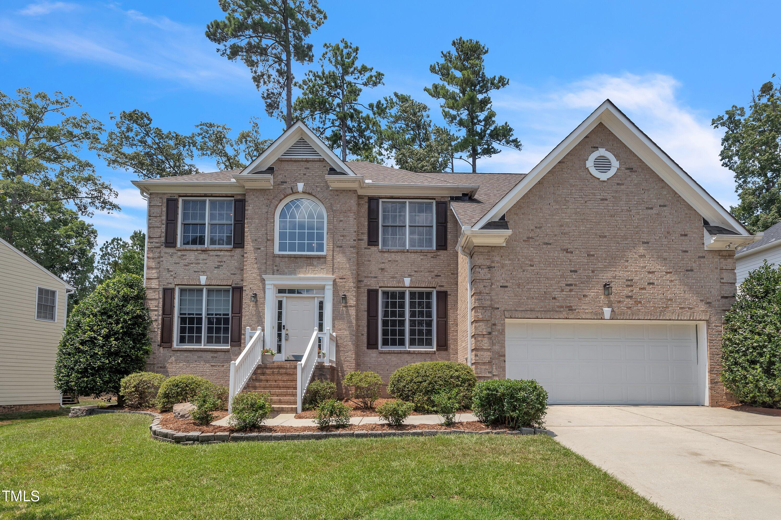 4702 Regency Drive Durham, NC 27713 - Photo 45 of 45 a front view of a house with a yard
