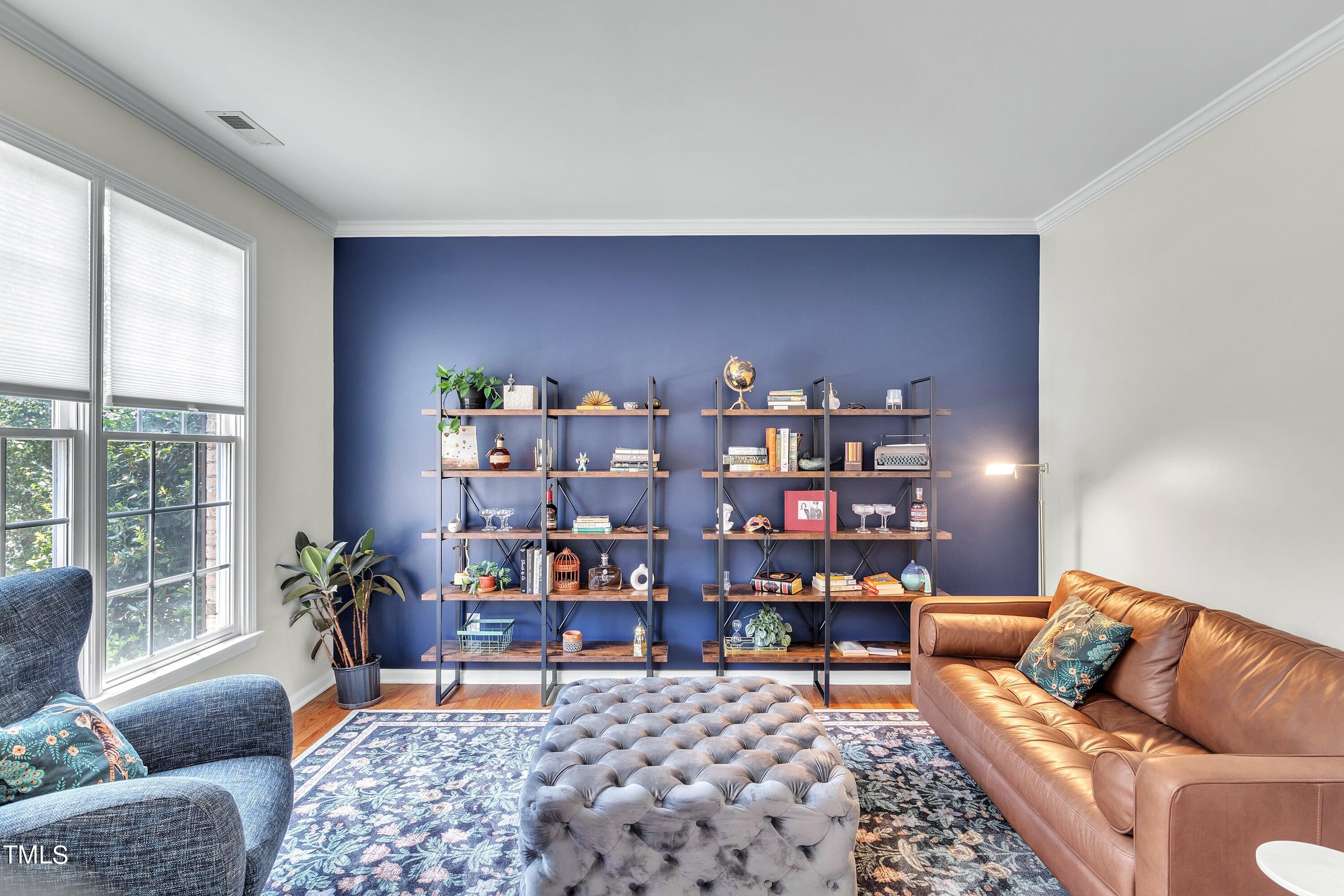 4702 Regency Drive Durham, NC 27713 - Photo 6 of 45 a living room with furniture and a rug