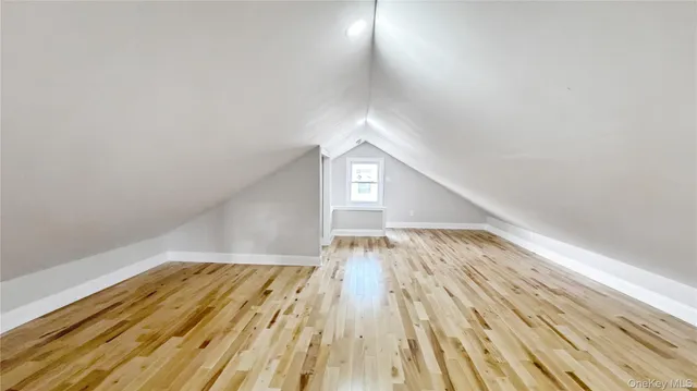 a view of staircase with rug