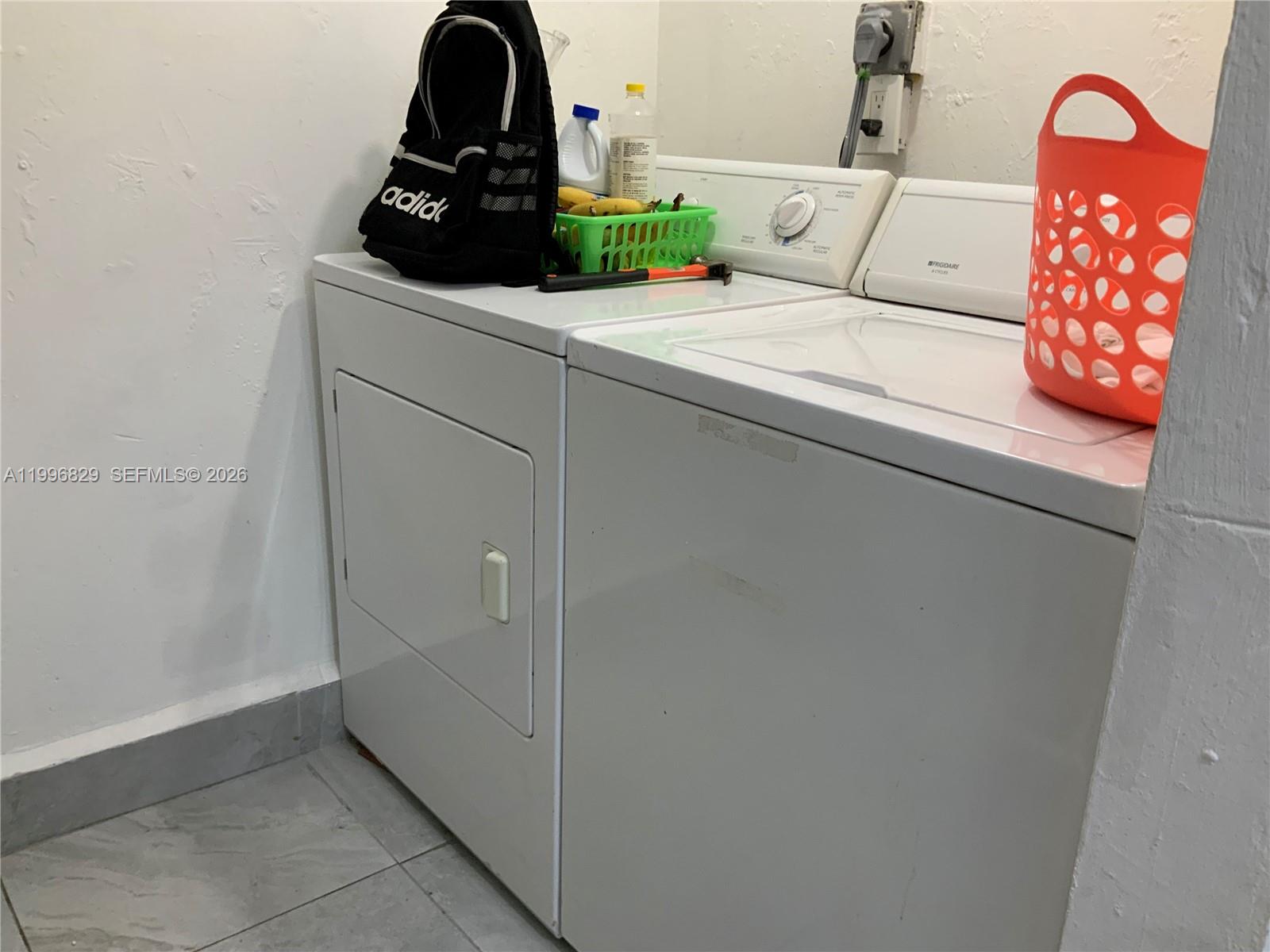 1300 West 53rd Street, Unit 35 Hialeah, FL 33012 - Photo 6 of 9 a bathroom with a sink and mirror