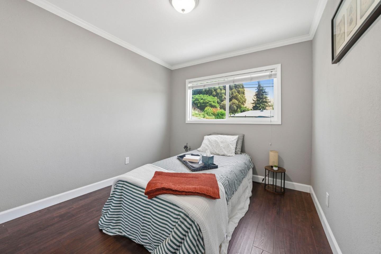 2793 Ruff Court Pinole, CA 94564 - Photo 19 of 53 a bedroom with a bed and a window