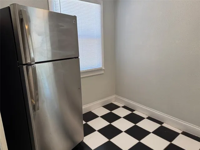 a black and white checkered floor with a black and white checkered floor