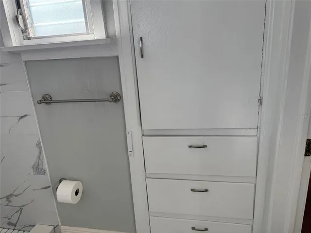 a bathroom with a window