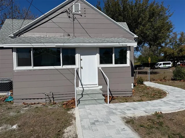 a view of a house with a patio