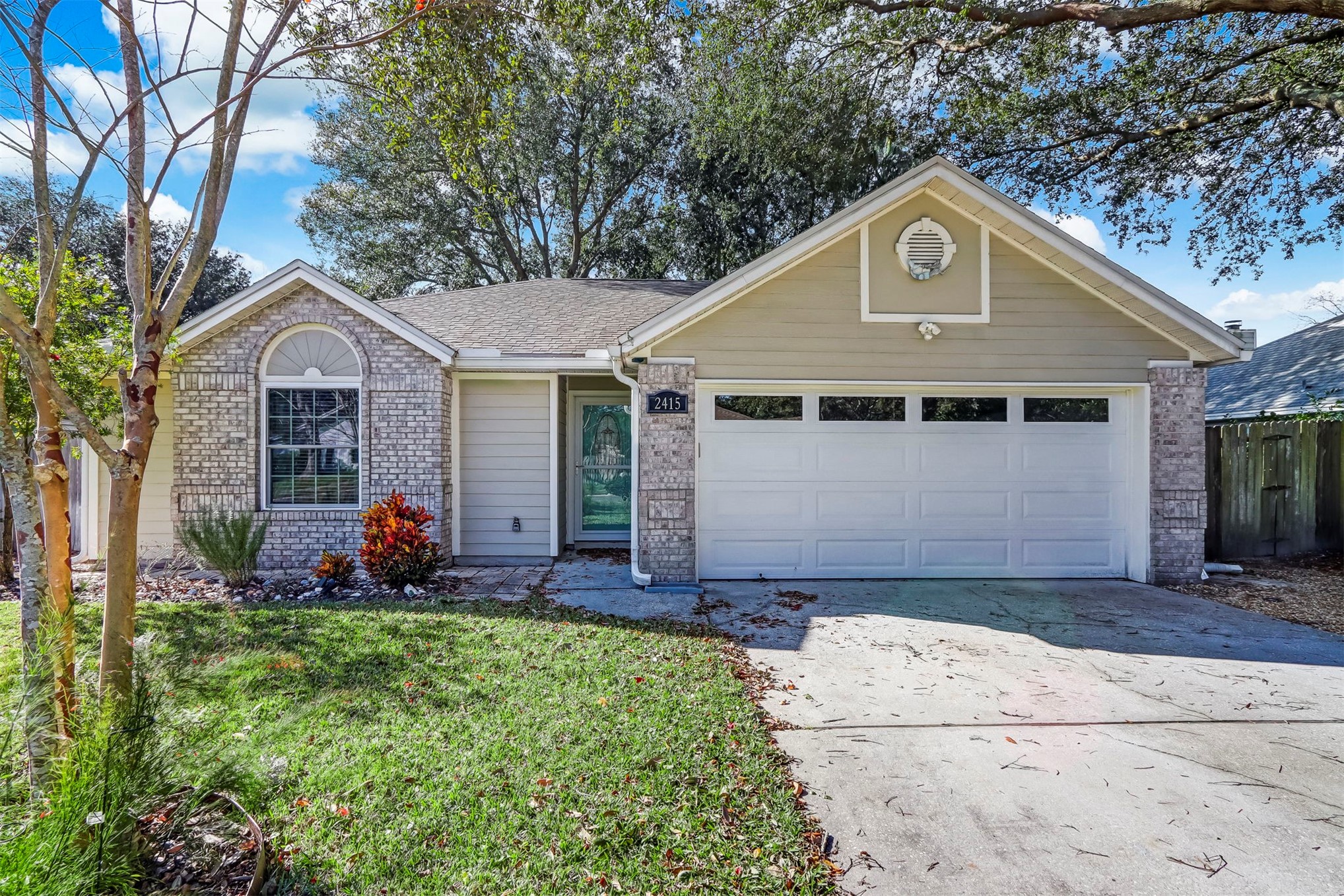 2415 Will Hardee Road Fernandina Beach, FL 32034 - Photo 1 of 59 a front view of a house with a yard