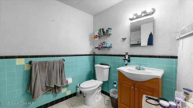 a view of a swimming pool and outdoor seating