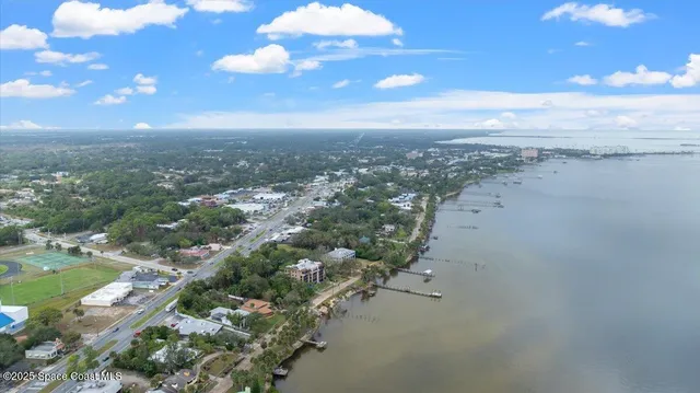 a view of a chairs and table in patio