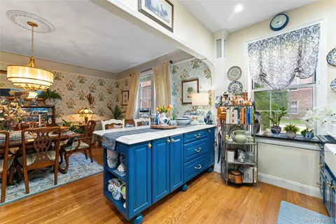 a view of a kitchen and dining room