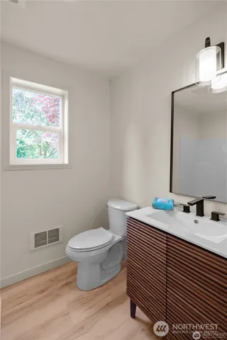 a bathroom with a sink and a toilet