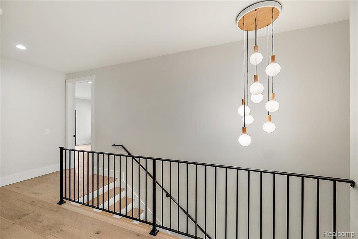 13459 Haddon Street Fenton, MI 48430 - Photo 29 of 84 Hall featuring an upstairs landing, light wood-style floors, and recessed lighting