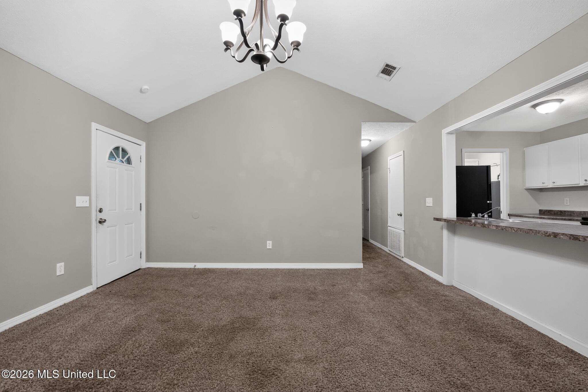 1407 Summit Avenue Jackson, MS 39212 - Photo 2 of 20 03_1407_Summit_Ave-Living_room-8400