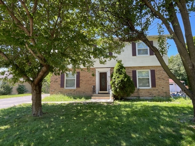 2411 Leckrone Drive Plainfield, IL 60586 - Photo 1 of 11 a view of house with a tree in front of a house