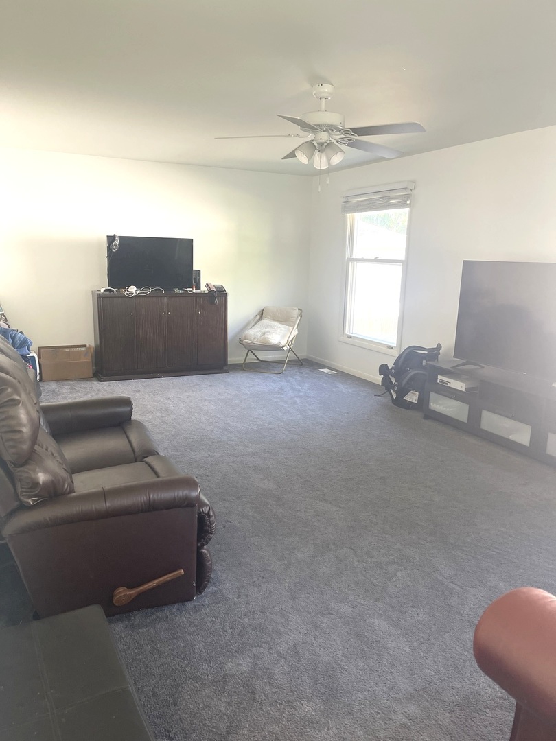 2411 Leckrone Drive Plainfield, IL 60586 - Photo 4 of 11 a living room with furniture and a window