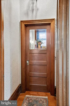 a view of bedroom with wooden floor