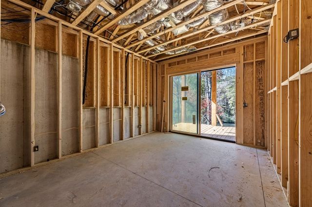 a view of a room with wooden walls