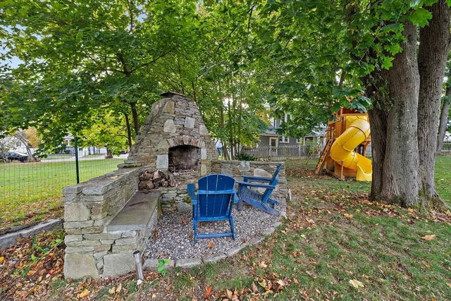 a backyard of a house with seating space