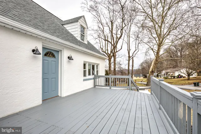 a view of a fence and trees