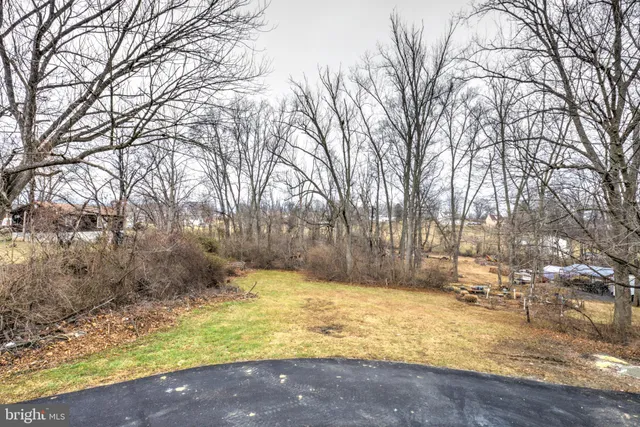 a view of swimming pool with an outdoor space and seating area