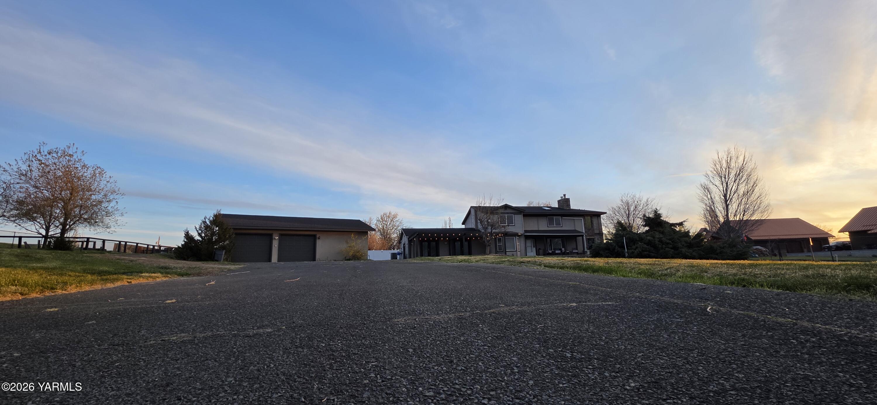 8601 Scenic Drive Yakima, WA 98908 - Photo 4 of 52 a view of a house with outdoor space and sitting area