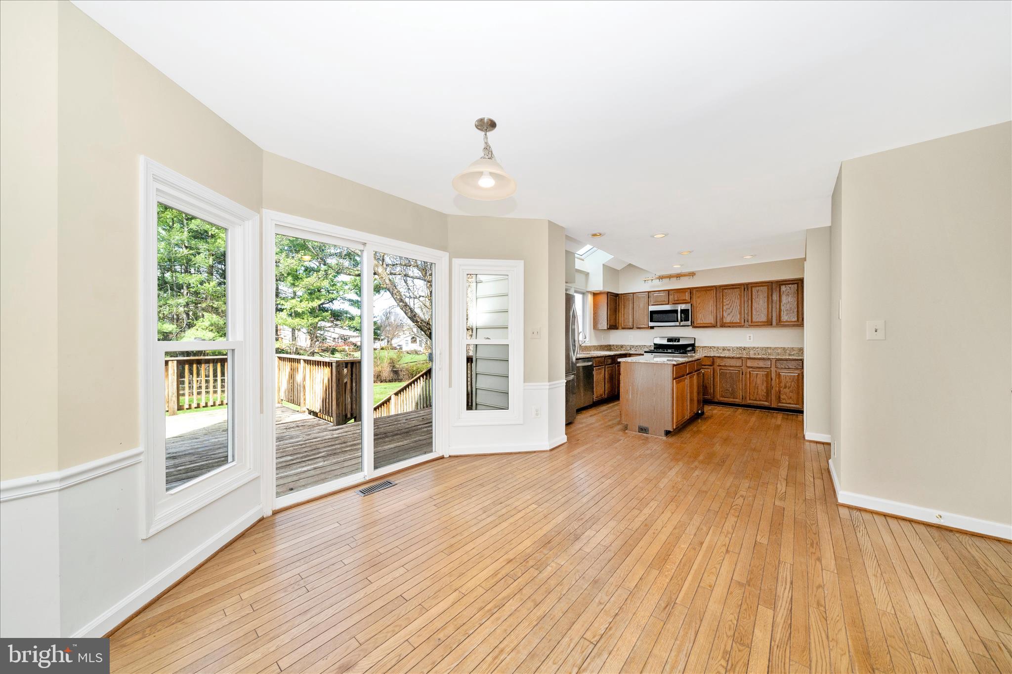 17004 Spates Hill Road Poolesville, MD 20837 - Photo 17 of 67 a view of a kitchen with furniture wooden floor and a kitchen