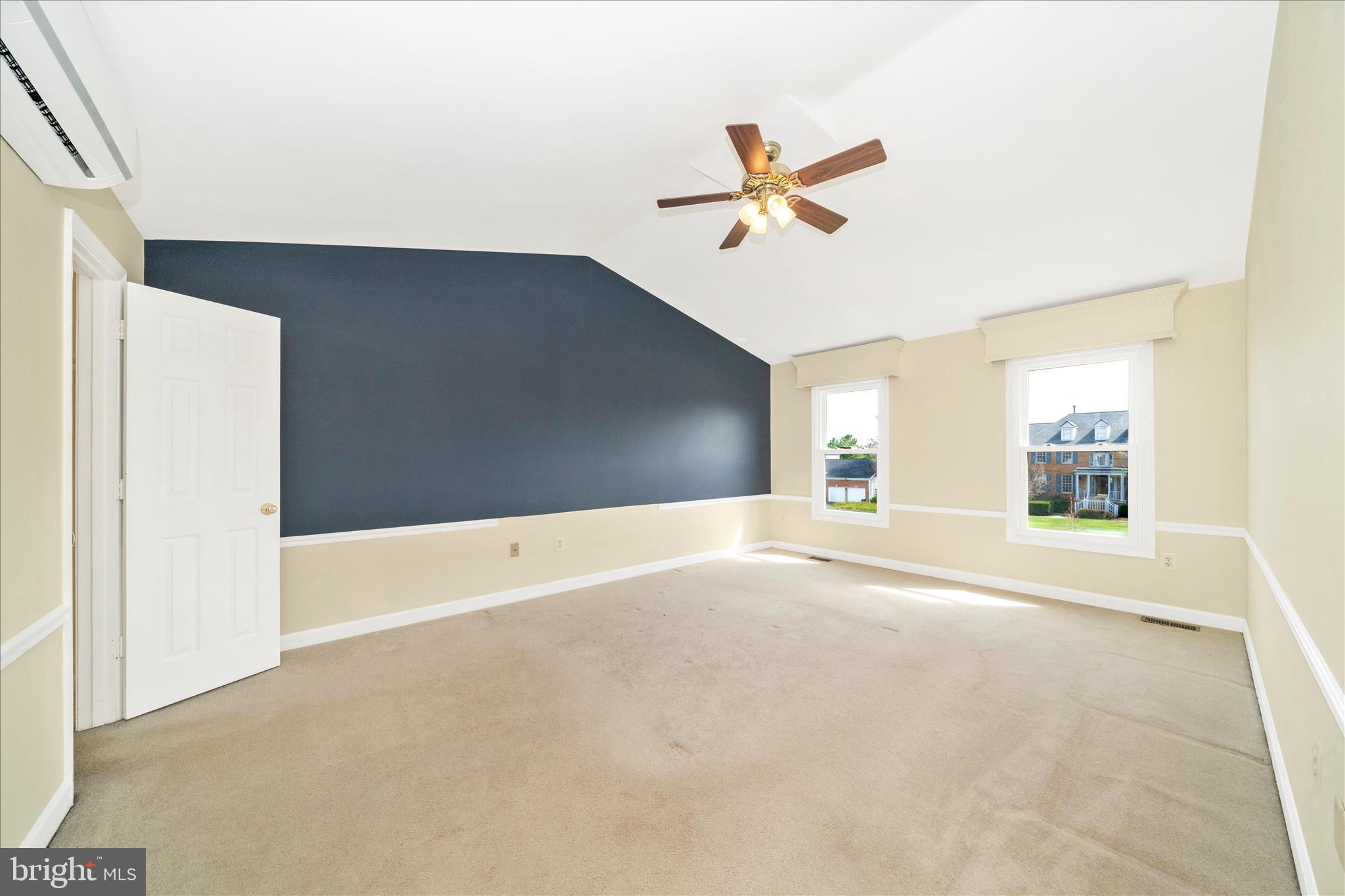 17004 Spates Hill Road Poolesville, MD 20837 - Photo 26 of 67 a view of a livingroom with a ceiling fan and window