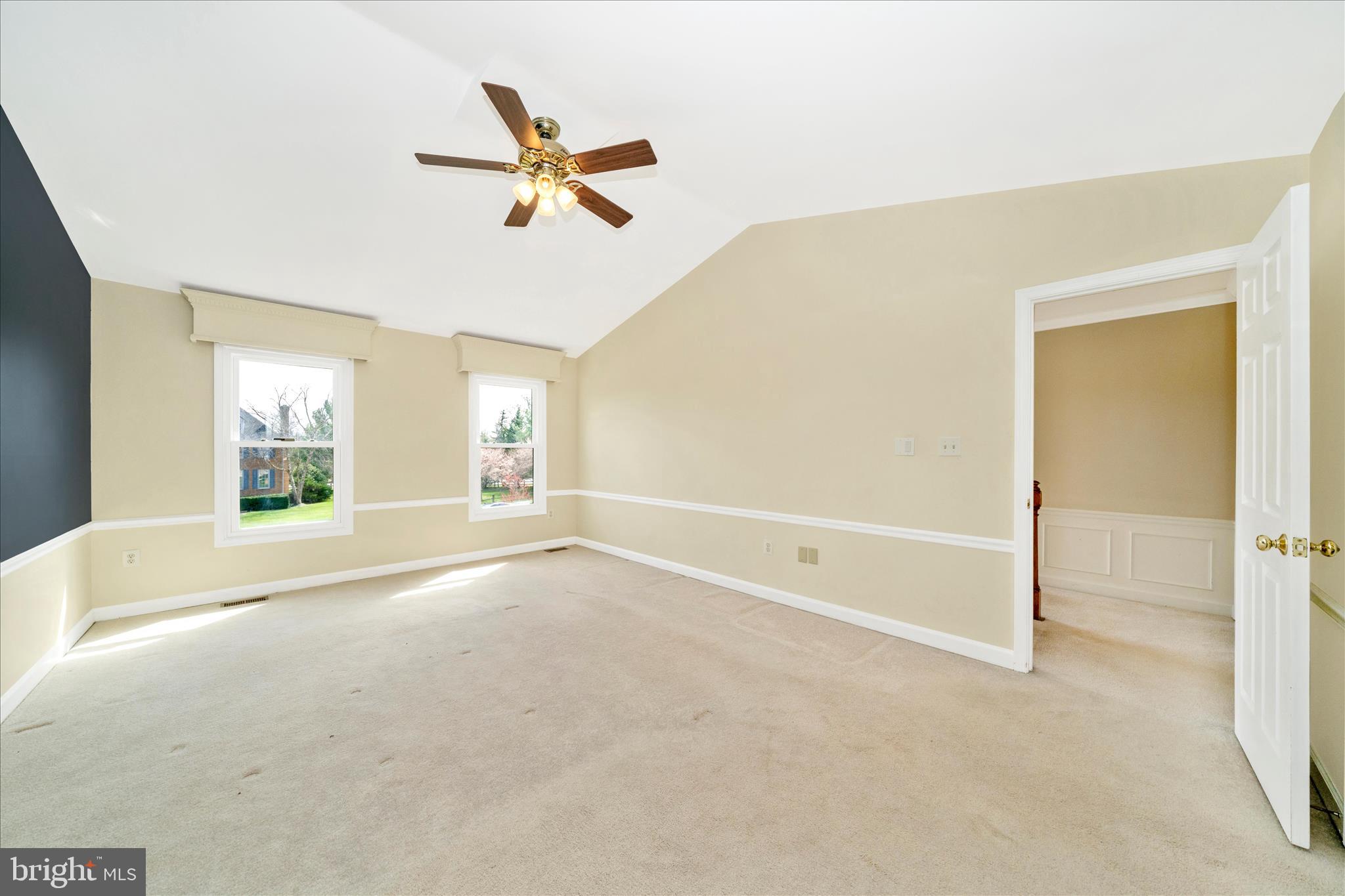 17004 Spates Hill Road Poolesville, MD 20837 - Photo 27 of 67 a view of a livingroom with a ceiling fan and window