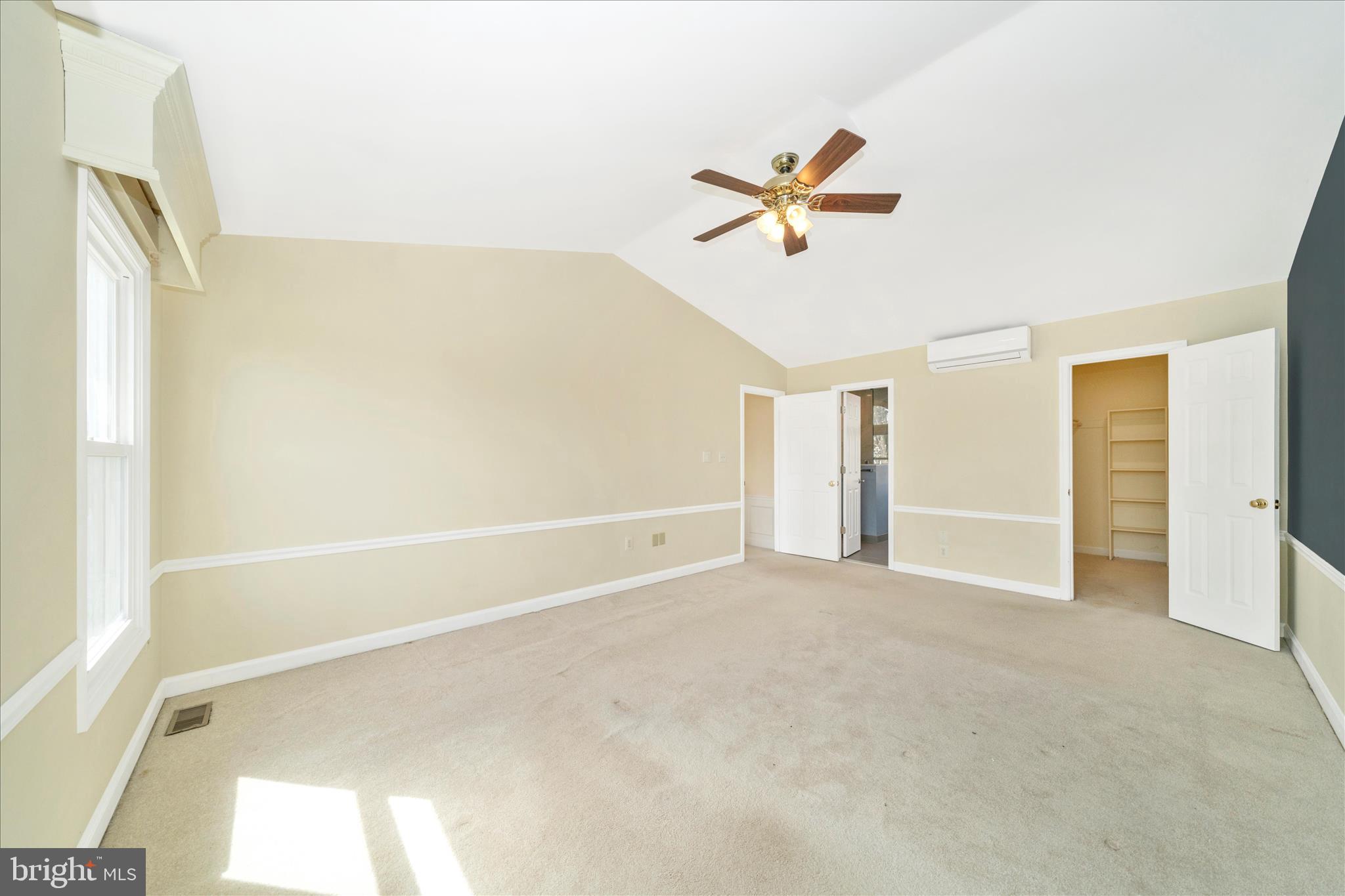 17004 Spates Hill Road Poolesville, MD 20837 - Photo 28 of 67 a view of a room with a ceiling fan and window