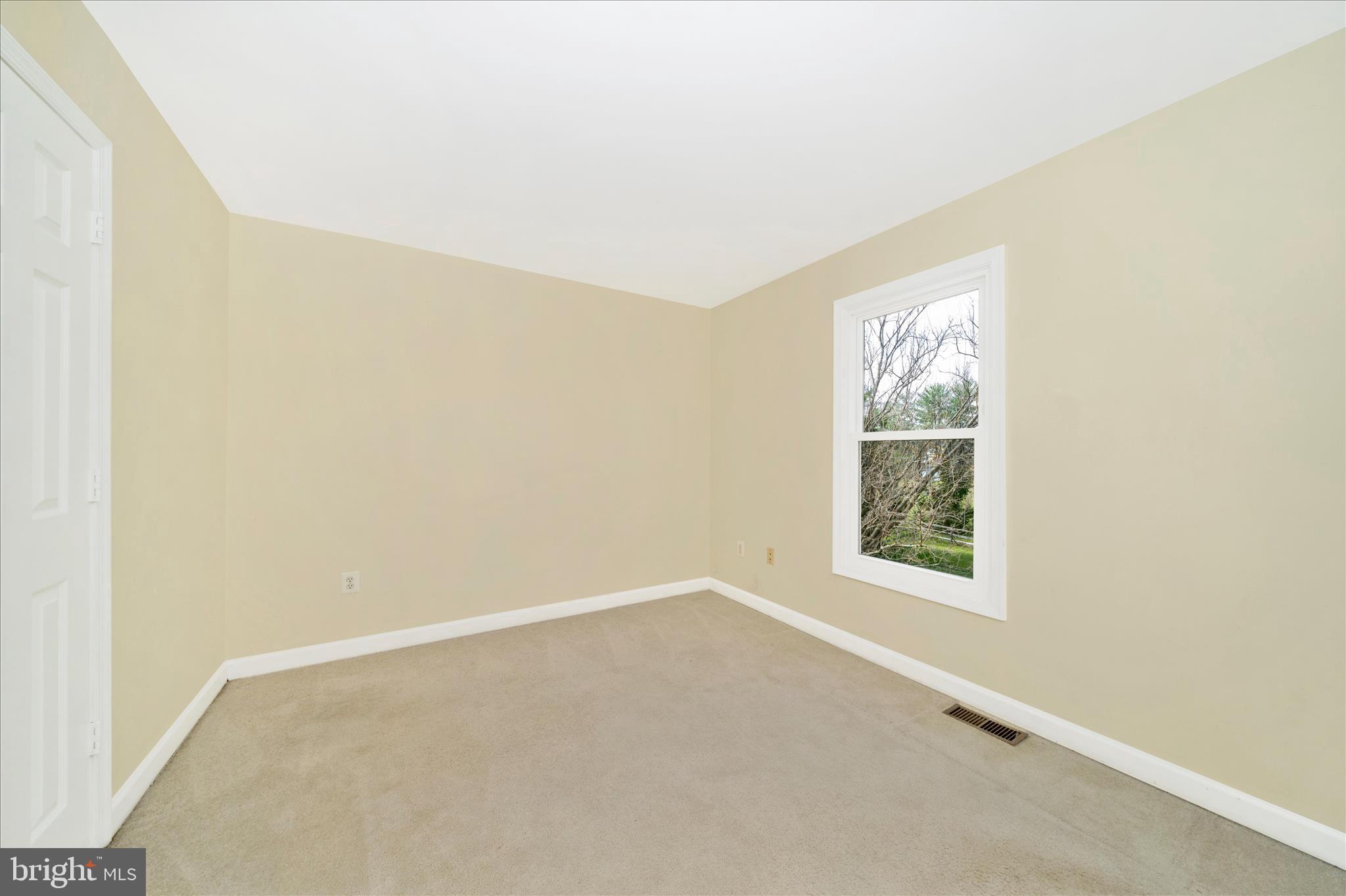 17004 Spates Hill Road Poolesville, MD 20837 - Photo 31 of 67 an empty room with a window
