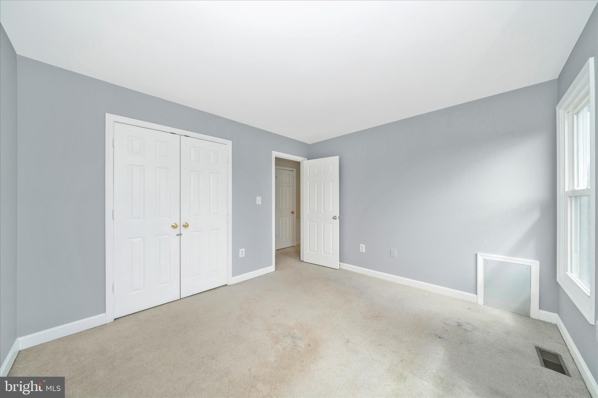 17004 Spates Hill Road Poolesville, MD 20837 - Photo 36 of 67 a view of an empty room and a window