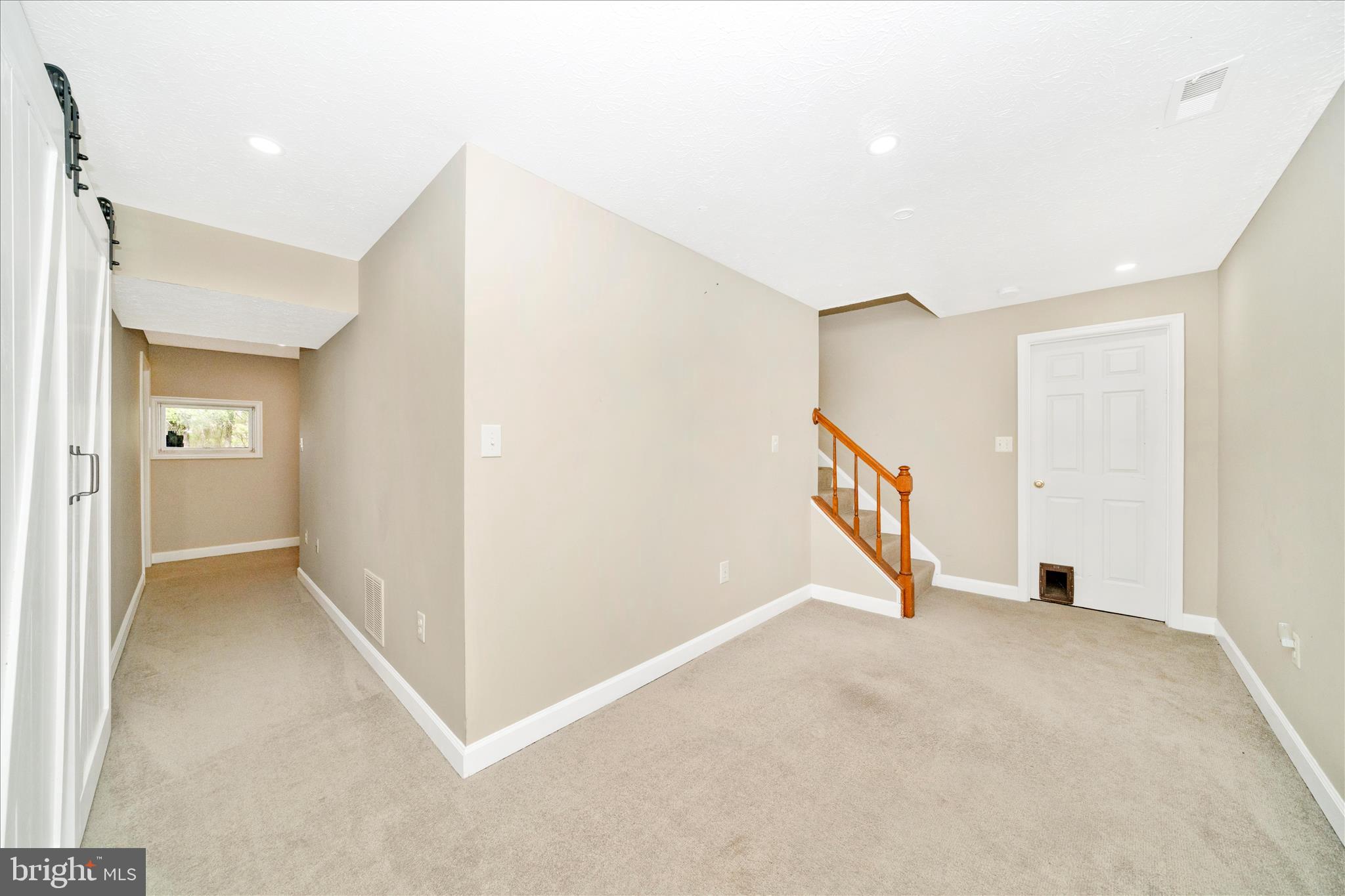 17004 Spates Hill Road Poolesville, MD 20837 - Photo 38 of 67 a view of an empty room with wooden floor