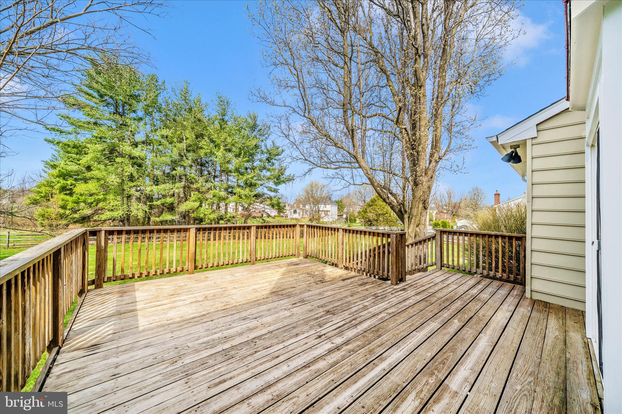 17004 Spates Hill Road Poolesville, MD 20837 - Photo 47 of 67 a view of balcony with wooden floor and fence