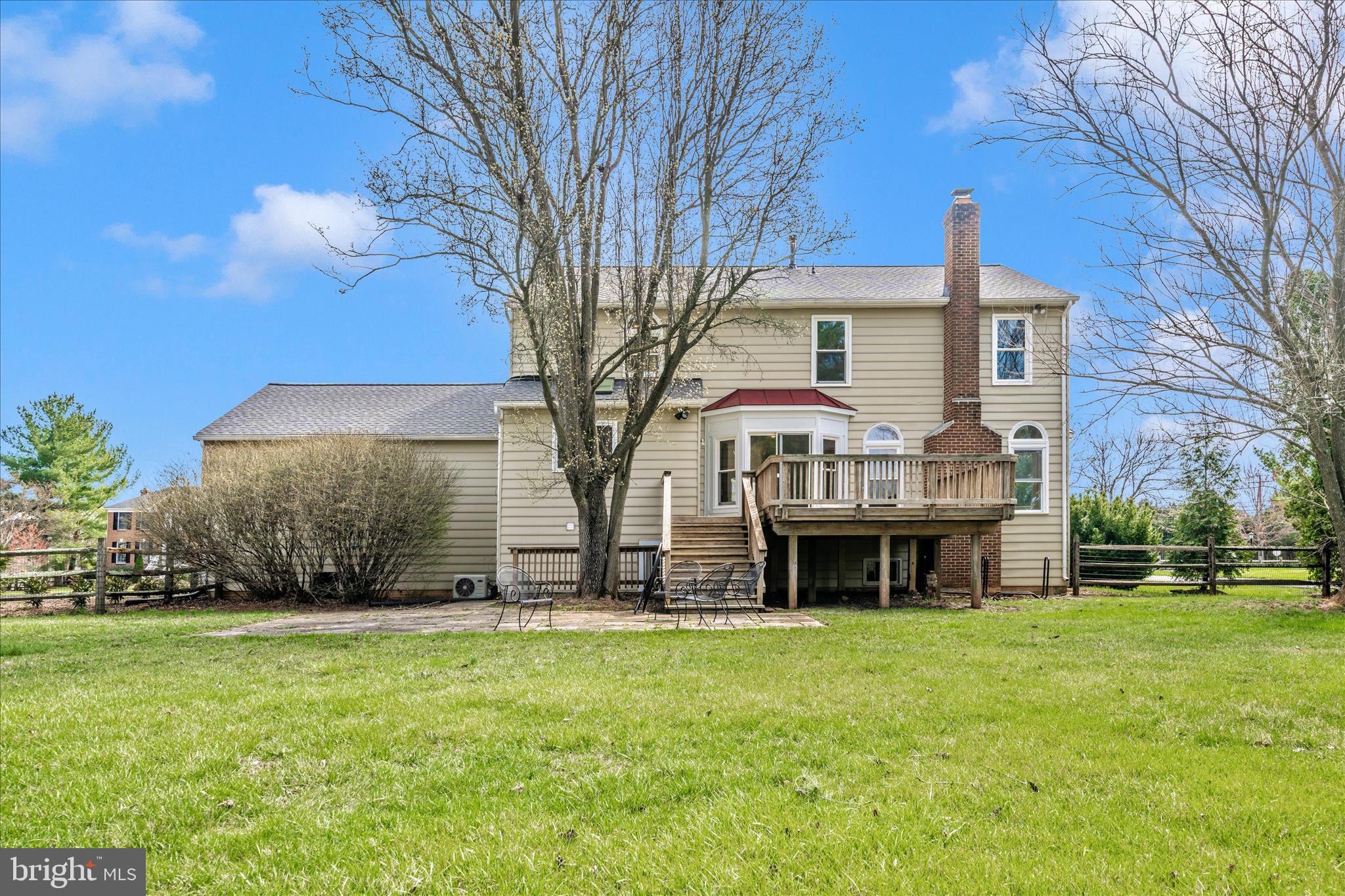 17004 Spates Hill Road Poolesville, MD 20837 - Photo 53 of 67 a view of a house with a yard and large tree
