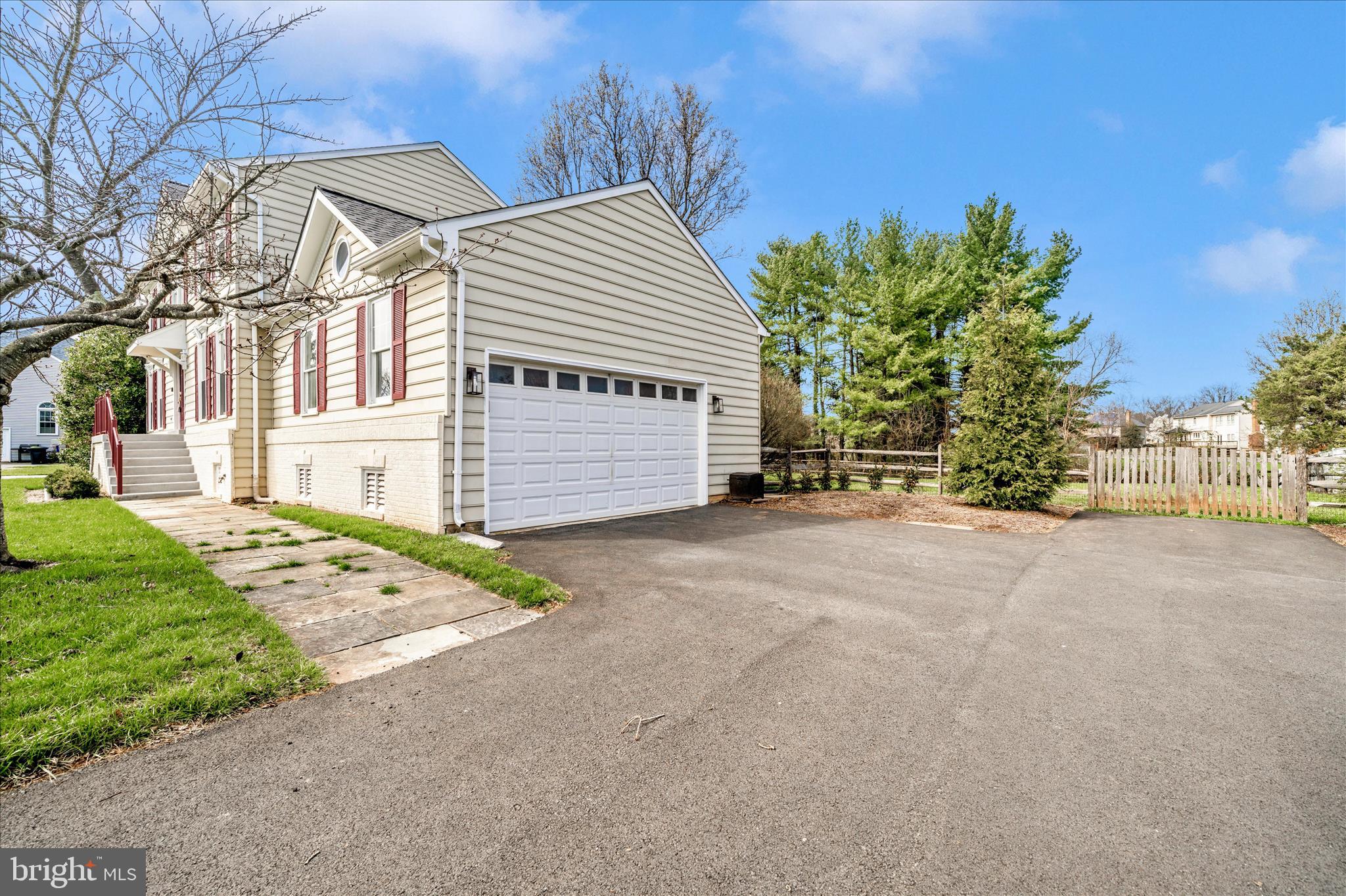 17004 Spates Hill Road Poolesville, MD 20837 - Photo 60 of 67 a view of a house with a yard and garage