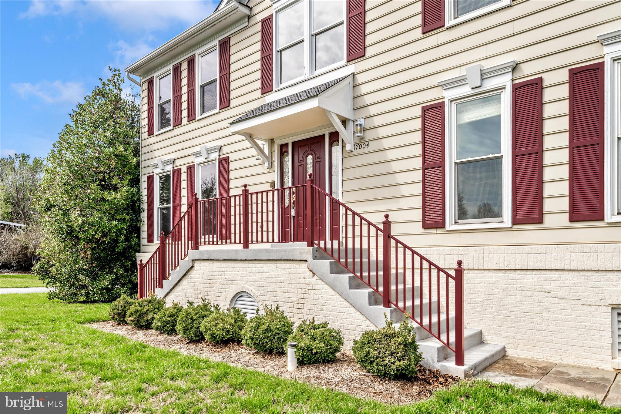 17004 Spates Hill Road Poolesville, MD 20837 - Photo 61 of 67 a front view of a house with a yard