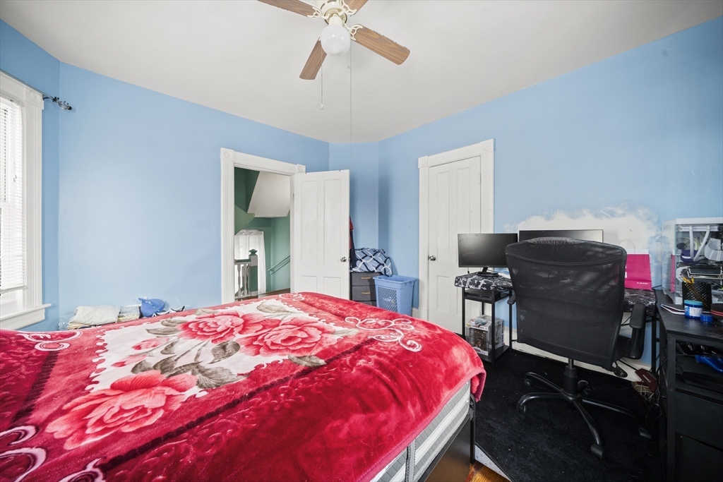 55 Malden Street Springfield, MA 01108 - Photo 28 of 40 a bedroom with a bed and a dresser